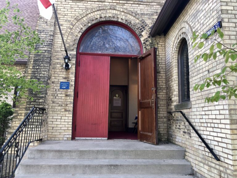 The red doors of our bell tower entrance.