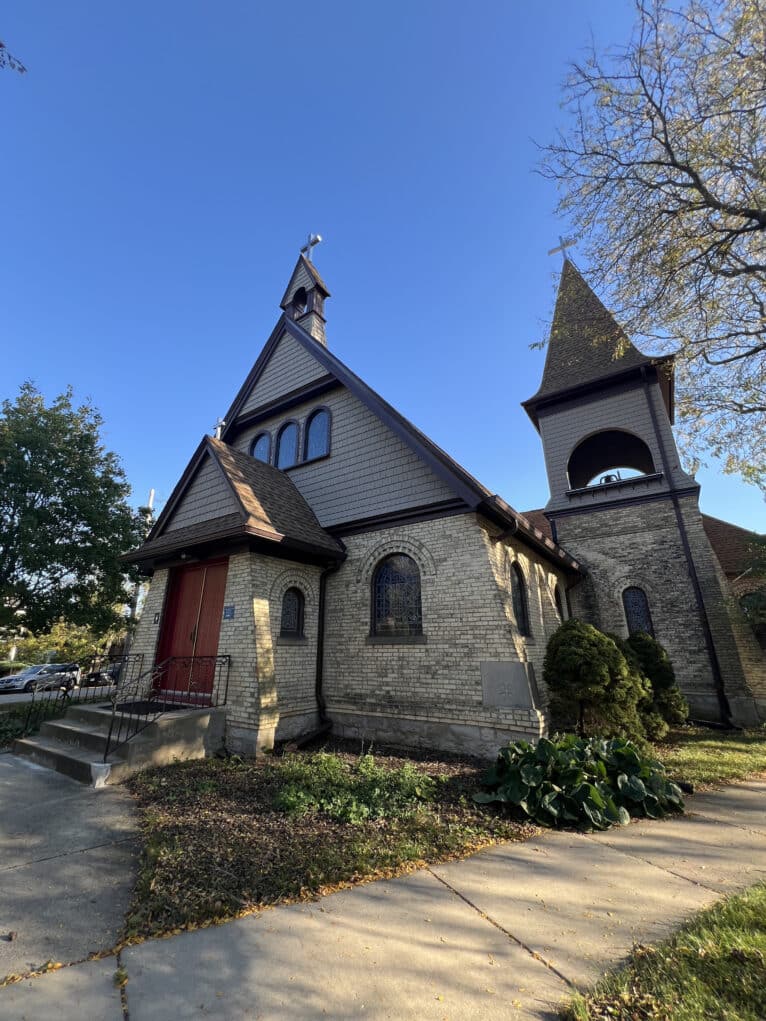 A photo looking up at the church