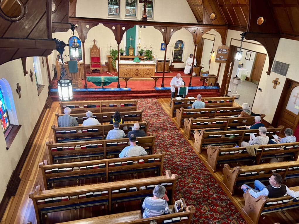 A look from the organ bench of the people in the pews.